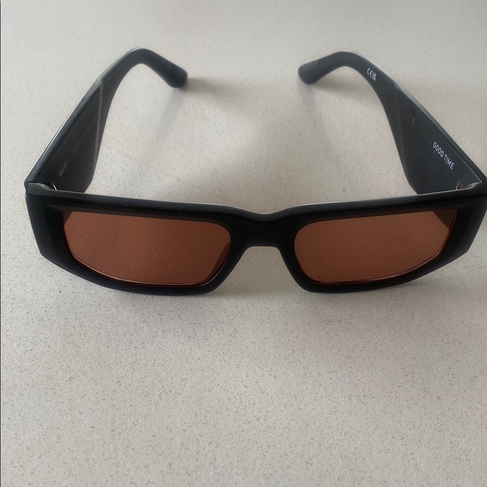 Black Sunglasses with Orange Lenses
